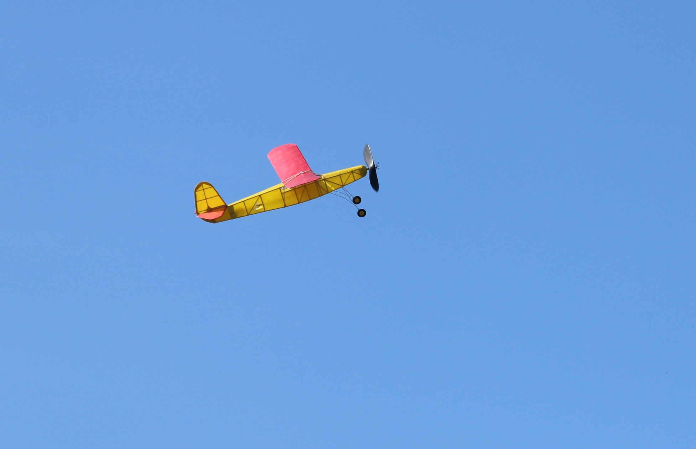 Gary Law's Flying Aces Moth in a clear blue sky